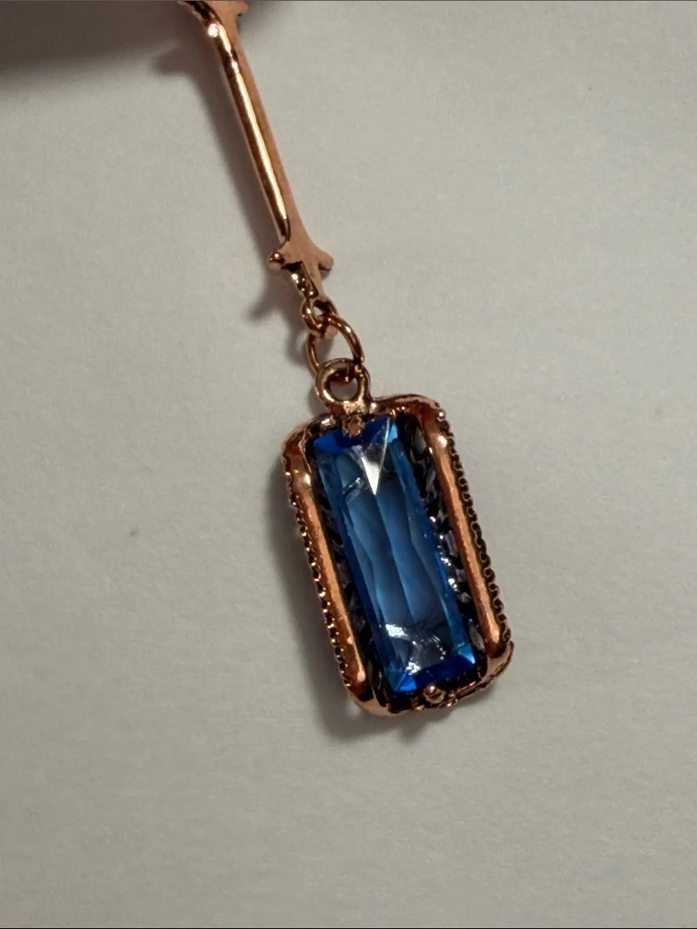 Blue Crystal Drop Earrings in Rose Gold Tone